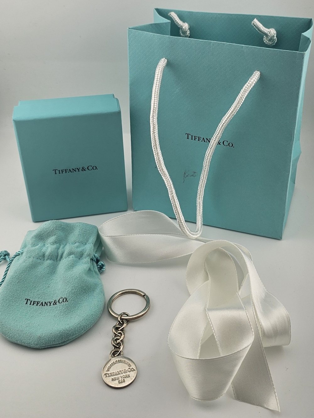 Tiffany & Co. Silver-Tone Round Tag Keyring with Tiffany Blue Pouch & Box